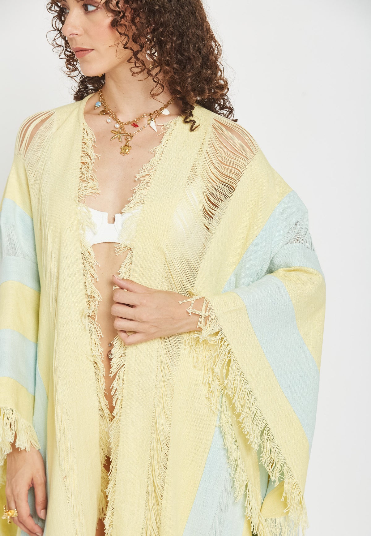 Claralé yellow poncho