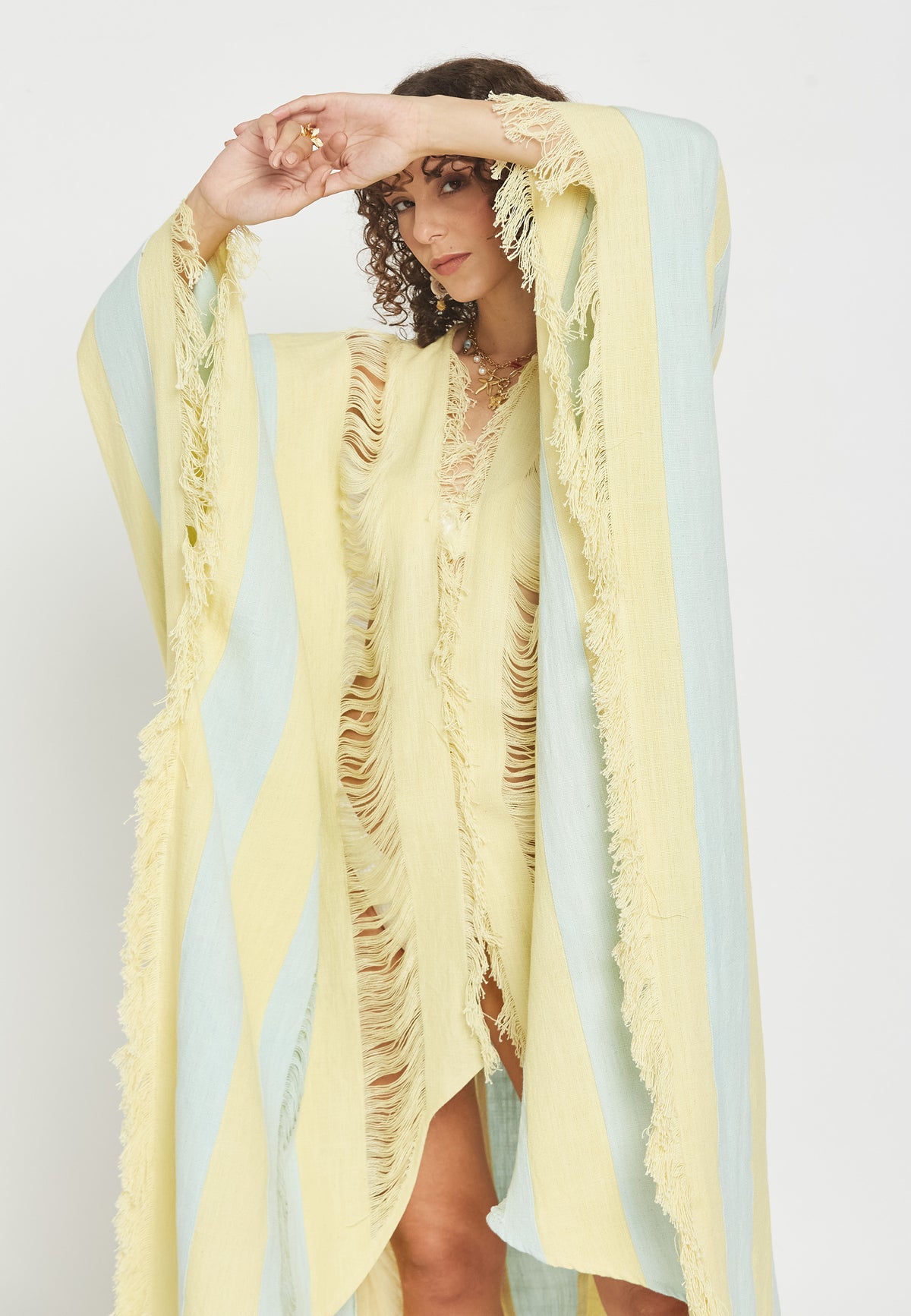 Claralé yellow poncho