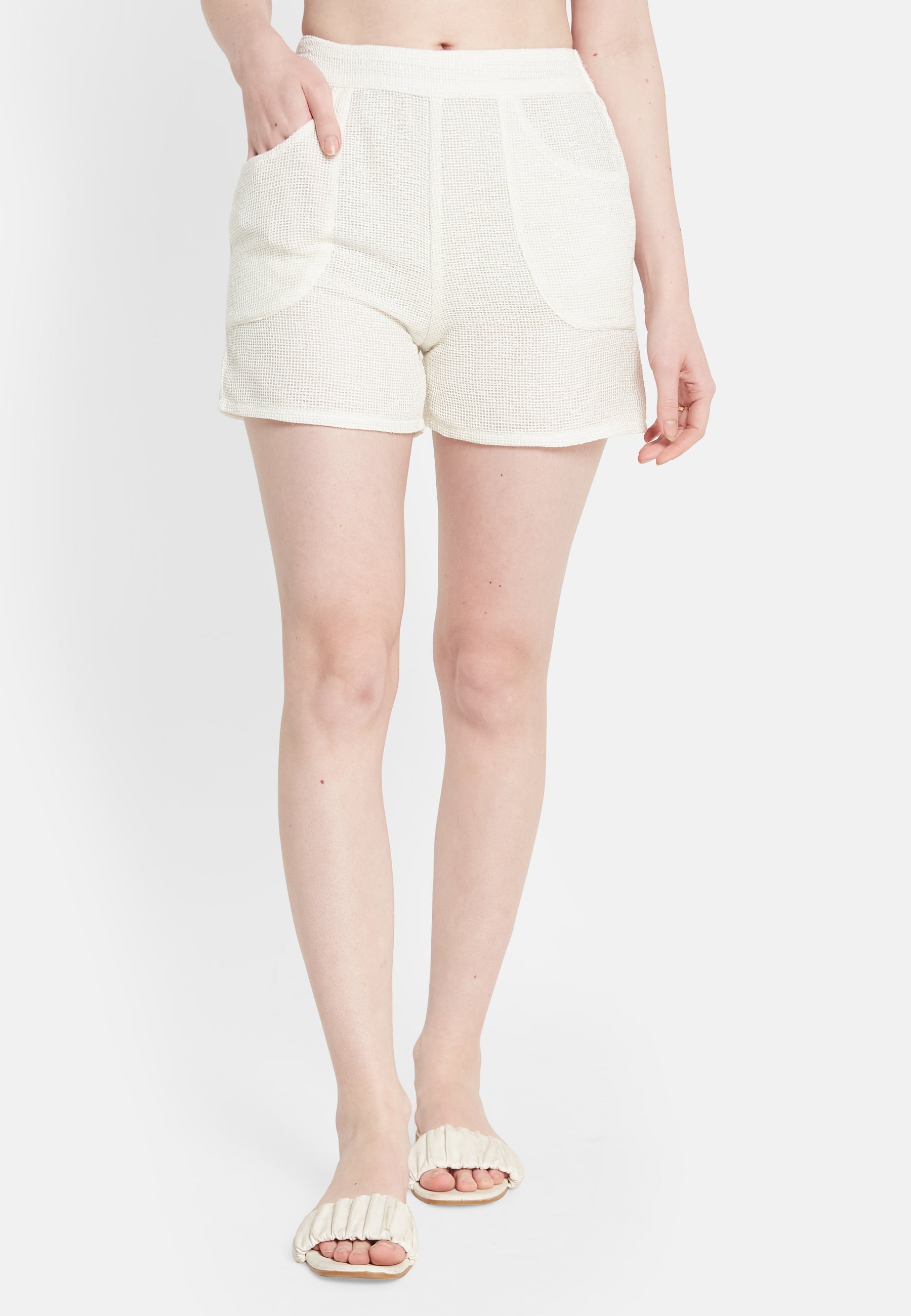Pantalones cortos blancos de la bahía