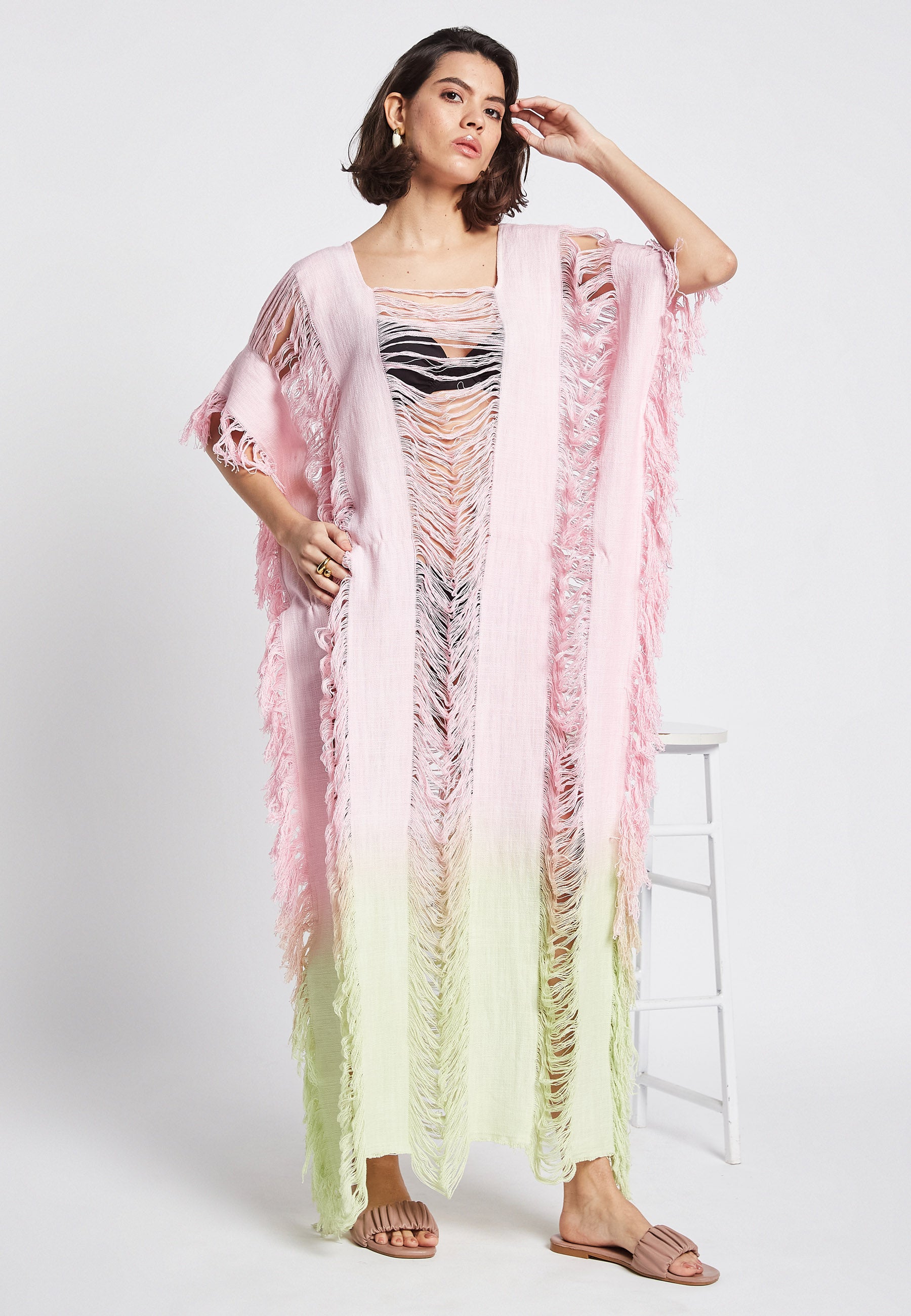 Poncho rosa iluminado por el sol