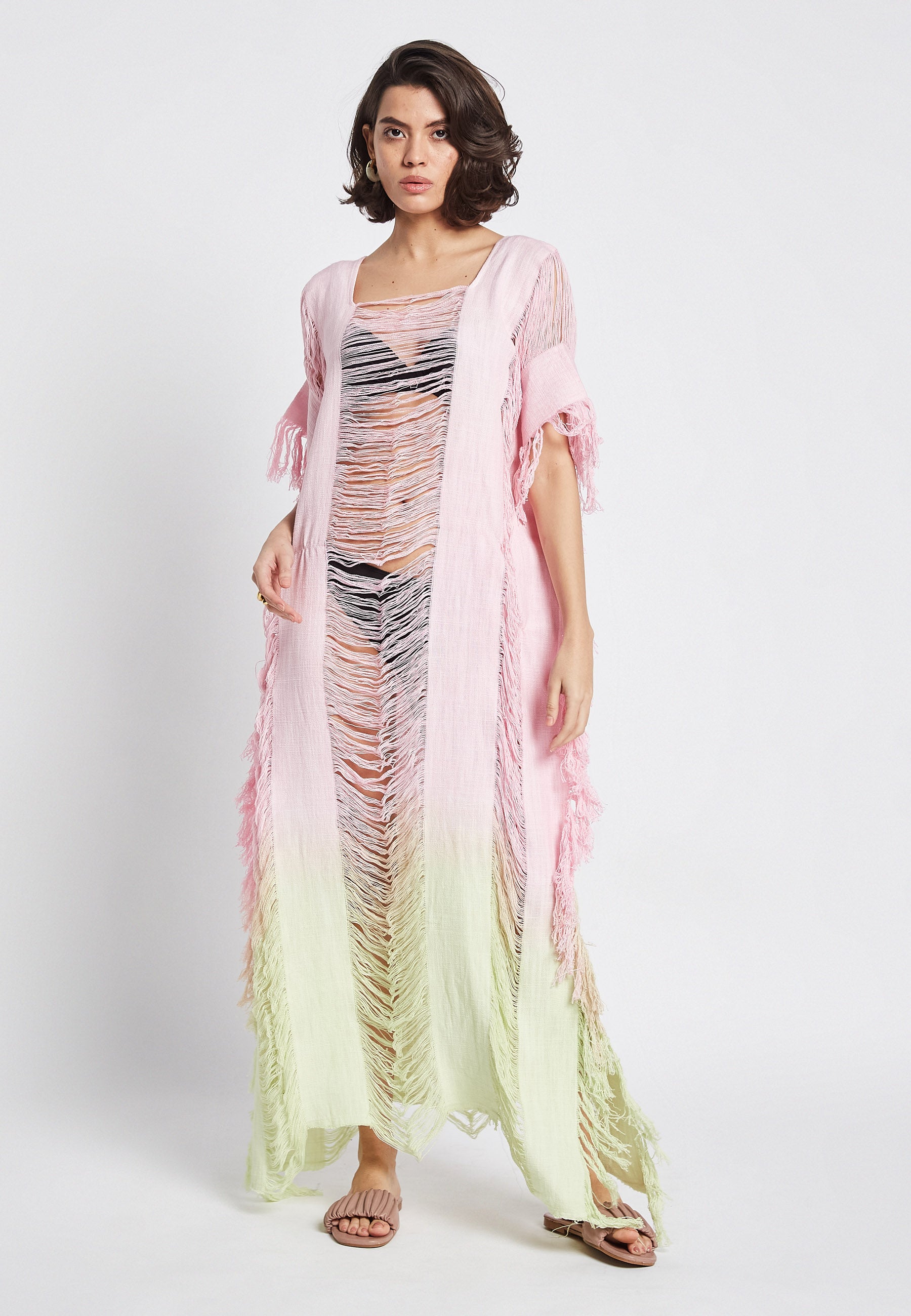 Poncho rosa iluminado por el sol