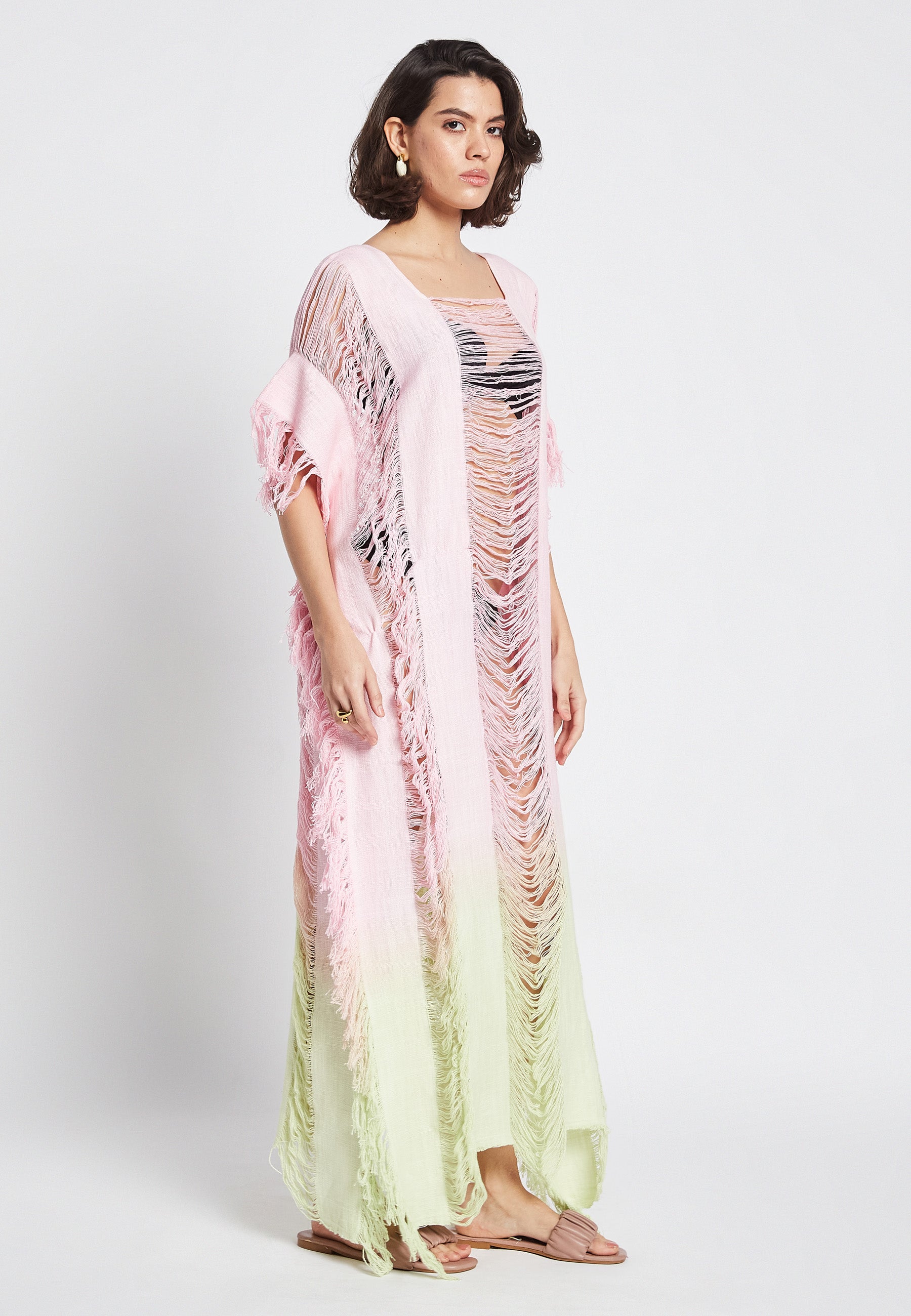 Poncho rosa iluminado por el sol