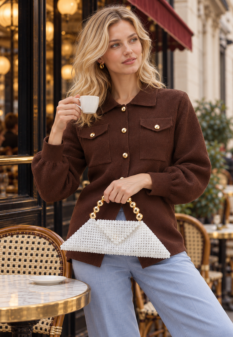 Arctic handbag — parisian café overhead editorial — 20261010