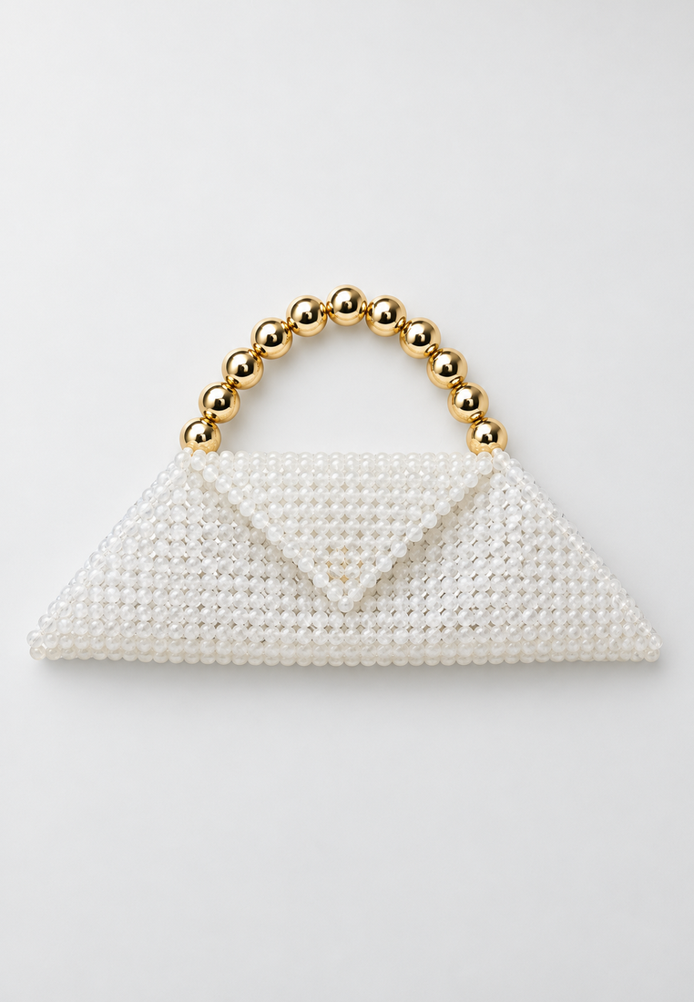 Arctic handbag — parisian café pr flat lay — 20261010